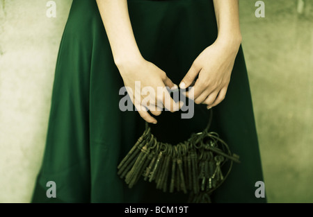 Frau mit Schlüssel, close-up der Hände Stockfoto