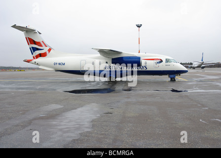 Dornier Do328 Regional Jet Airliner am Flughafen Helsinki-Vantaa, Finnland. Stockfoto