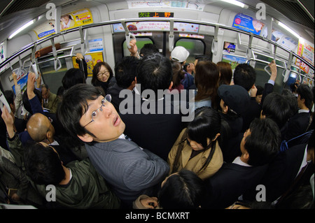 Pendler auf eine Rush-Hour trainieren, Tokio, Japan, 2. Januar 2008. Stockfoto