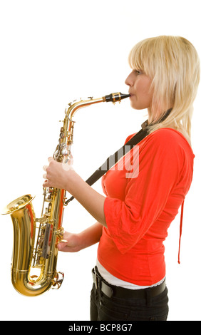 Junge blonde Frau Spielt Auf Einem Saxophon Stockfoto