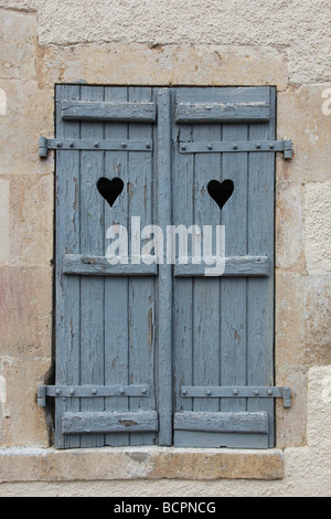 Blauen Fensterläden Stockfoto