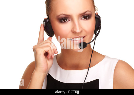 Ein schön und lächelnd Hotline-Betreiber mit Kopfhörer Stockfoto