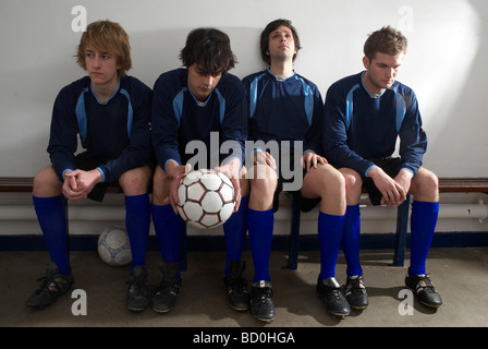 Fussballer in einem Umkleideraum Stockfoto