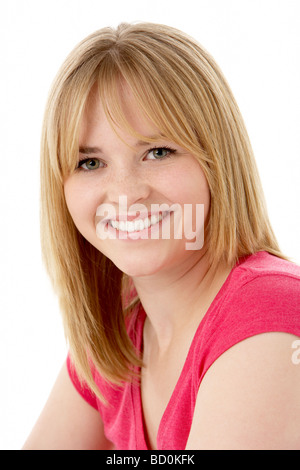 Studioportrait Of Smiling Teenager-Mädchen Stockfoto