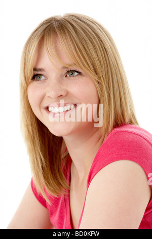 Studioportrait Of Smiling Teenager-Mädchen Stockfoto