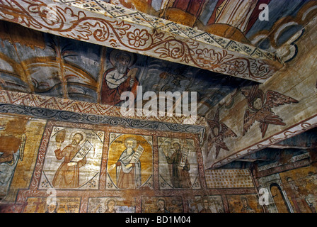 Hölzerne 14. Jahrhundert griechisch katholischen Kirche religiöse Innenmalereien im Ieud in Rumäniens Maramures Grafschaft Stockfoto