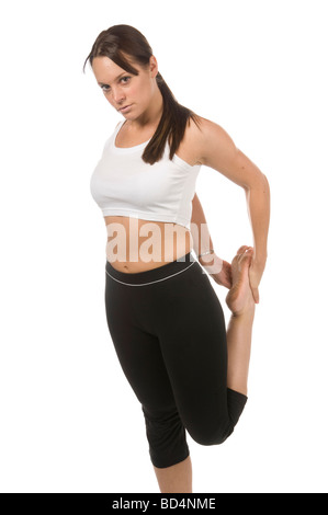 Lange braune kurzhaarige Frau Sportausrüstung tun Bein Strecken, Isolated On White Stockfoto