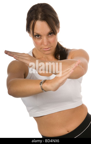 Frauen In Sportwear überqueren Arme, Isolated On White Stockfoto