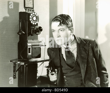 Gangster in der Telefonzelle Stockfoto