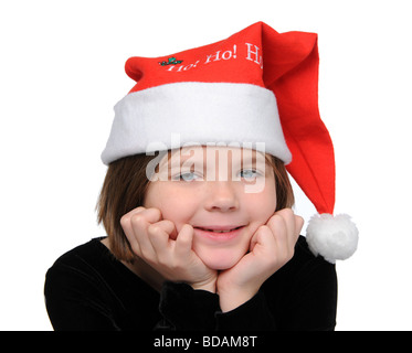Mädchen mit Weihnachtsmütze s isoliert auf weiss Stockfoto