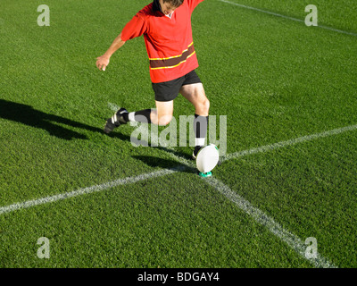 Rugby-Spieler munter ball Stockfoto