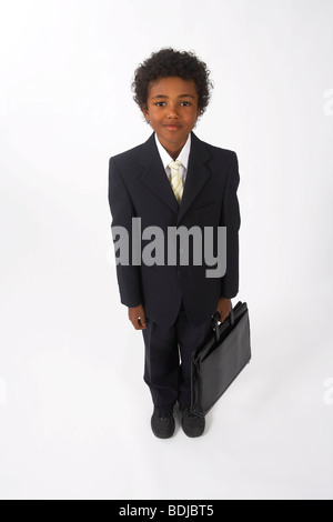 Kleiner Junge verkleidet als Geschäftsmann Stockfoto