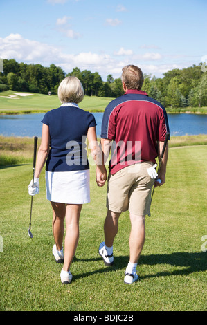 Paar, Golfen Stockfoto