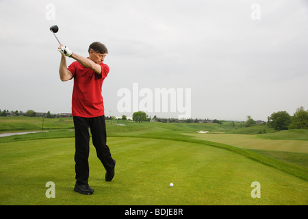 Mann, Golfen Stockfoto