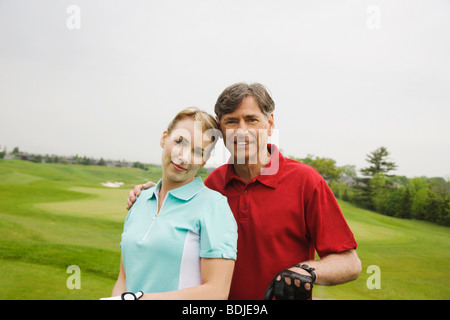 Vater und Tochter Golfen Stockfoto