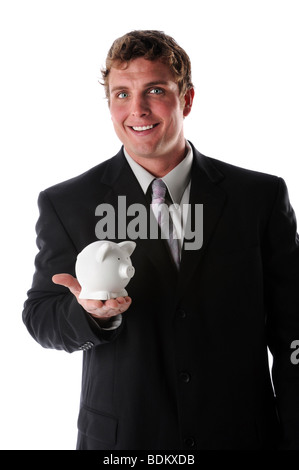 Man lächelt und hält ein Sparschwein auf einem weißen Hintergrund isoliert Stockfoto