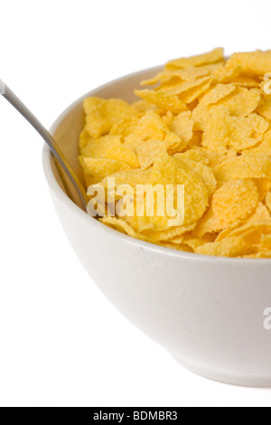 Cornflakes in Schüssel auf weißem Hintergrund Stockfoto