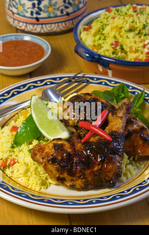 Piri Piri Hähnchen essen Stockfoto