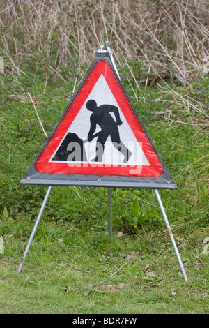 Männer am Werk-Schild Stockfoto