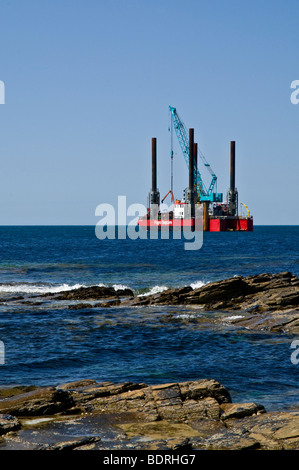 Dh Wave Power STROM DE Fugro Seacore mit finanzieller Unterstützung der Plattform positionieren Prüfstand off shore Billia Croo Orkney Stockfoto