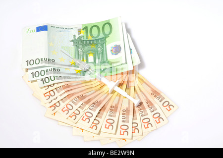 Spritze und Banknoten Stockfoto