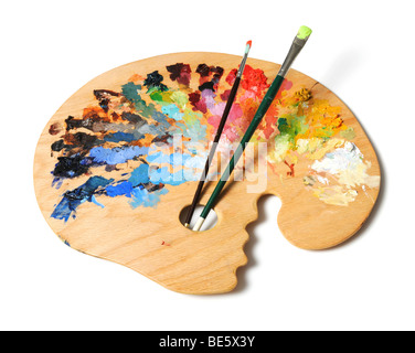 Ergonomische Künstler-Palette mit Bürsten, die über einen weißen Hintergrund isoliert Stockfoto