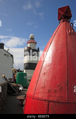 Alten Bouy & Leuchtturm, Hook Head, Irland Stockfoto