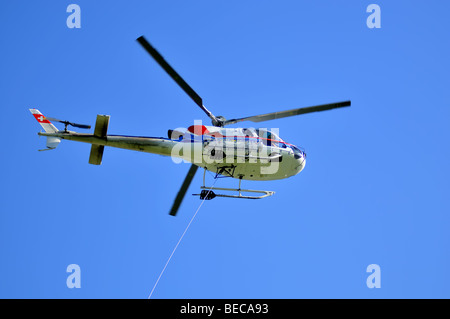 Hubschrauber und Tow Kabel Stockfoto