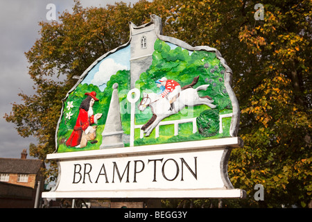 England, Cambridgeshire, Huntingdon, Brampton Dorf Schild mit Samuel Pepys und Rennbahn Stockfoto