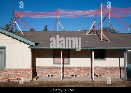 Kleine einzelne Familie Zuhause bereit für Großbauvorhaben. Es wird abgerissen und ersetzt werden. Silicon Valley, Kalifornien Stockfoto