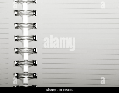Eine offene Spirale Notizbuch mit Linien Stockfoto
