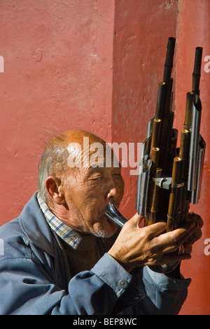 Chinesisch-Straße Musiker Lusheng in Peking Stockfoto