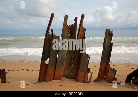 Bleibt der Stahl aufgetürmt Küstenschutzes bei Happisburgh, Norfolk, Großbritannien. Stockfoto