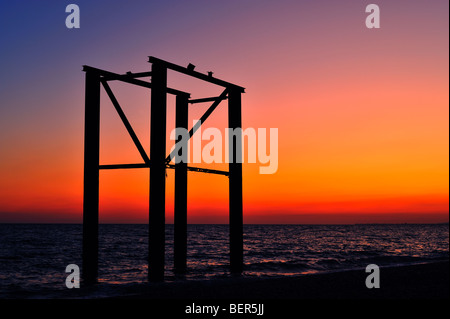 Brighton West Pier, Strand, Sonnenuntergang, Sussex, England Stockfoto