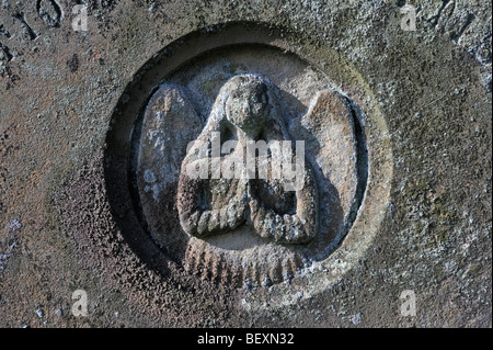 Detail der Grabstein mit Engel-Design. Kirche des Heiligen Laurentius, Appleby in Westmorland, Cumbria, England, Vereinigtes Königreich Stockfoto