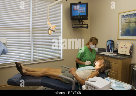 Zahnarzt und Patient, dass zahnärztliche Untersuchung, Miami Stockfoto