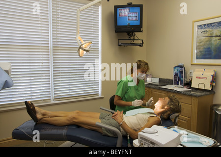 Zahnarzt und Patient, dass zahnärztliche Untersuchung, Miami Stockfoto