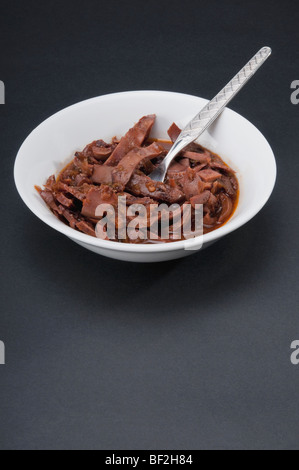 Nahaufnahme einer Schüssel Tintenfisch Fleisch Stockfoto