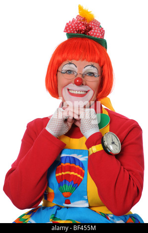 Happy Clown mit Hand am Kinn, die über einen weißen Hintergrund isoliert Stockfoto