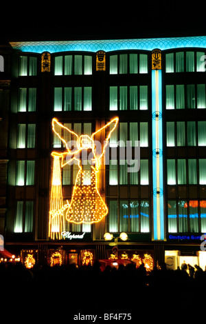 Weihnachten, Weihnachtsmarkt am Koelner Dom Kölner Dom, Weihnachtsschmuck, Engel auf dem 4711-Blau-Gold-Haus-Neubau Stockfoto