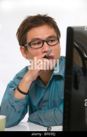 Junge asiatische Geschäftsmann Stockfoto