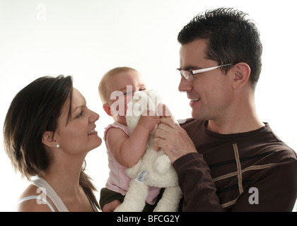 Familienbild von Mama, Papa und Baby Mädchen Stockfoto