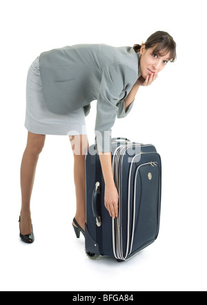 Business-Frau mit einem Gepäck auf weißem Hintergrund Stockfoto