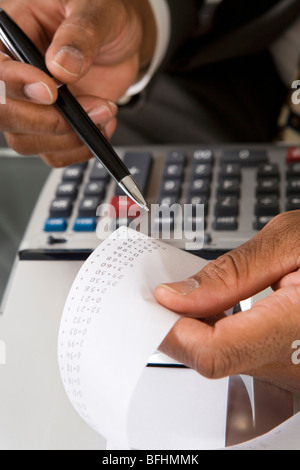 Steuerberater lesen hinzufügen Maschine Band Stockfoto