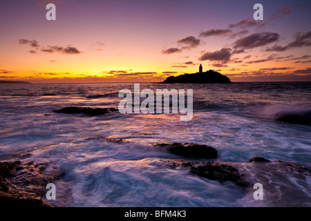 Flut an Sonnenuntergang, Godrevy Point und Leuchtturm, St. Ives Bay, North Cornwall Stockfoto