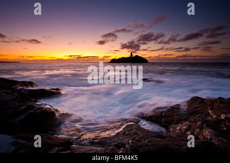 Flut an Sonnenuntergang, Godrevy Point und Leuchtturm, St. Ives Bay, North Cornwall Stockfoto