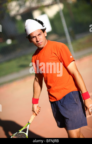 Tennisspieler auf Sandplätzen Stockfoto