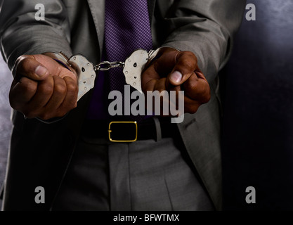 Business-Mann in Handschellen Stockfoto