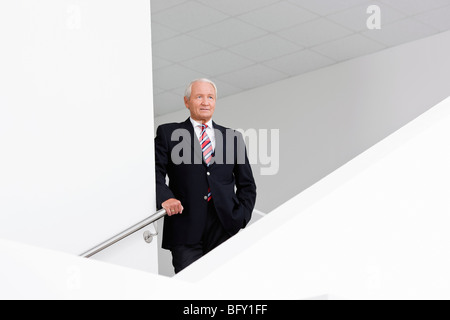 Geschäftsmann auf Treppe Stockfoto