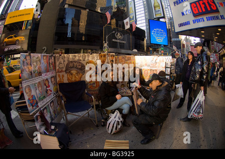 Street Art Künstler Zeichnung Kunden Porträts auf dem Times Square in New York auf Sonntag, 29. November 2009. (© Frances M. Roberts) Stockfoto